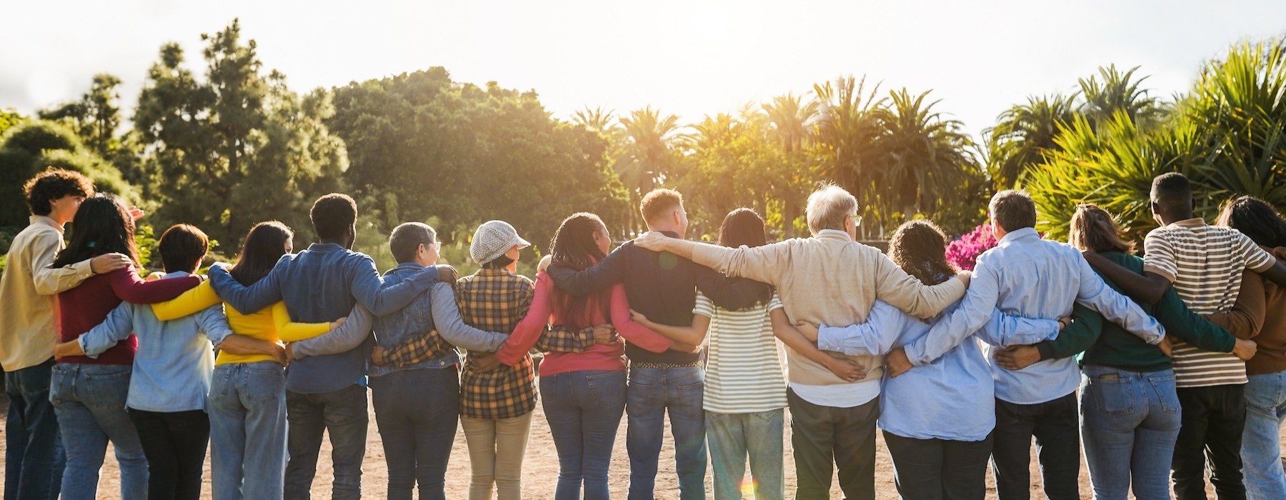 a group of people holding each other in a line