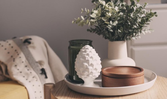 Find your perfect fit at DLP Jonesboro a vase with white flowers on a table